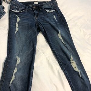 Sneak peak stretchy distressed jeans.